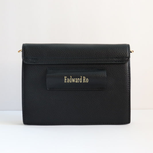 Back View: Black Pebble texture vegan leather, with Eadward Ro label on the back of the belt strap holder